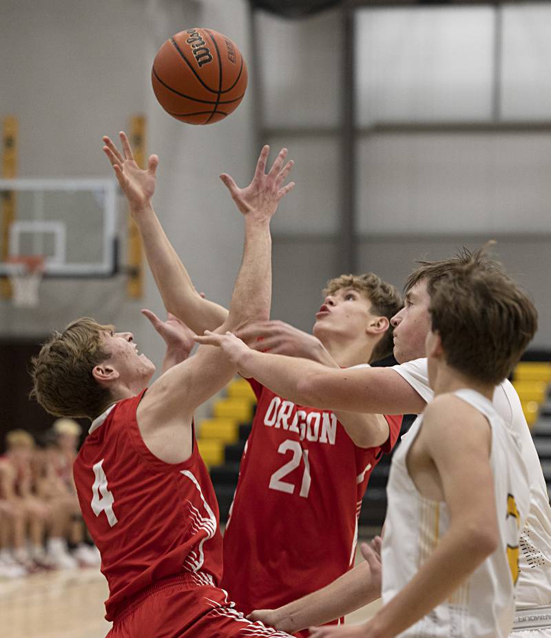 Oregon’s Jameson Caposey and Tucker O’Brien look to grab a loose ball against AFC Wednesday, Nov. 29, 2023