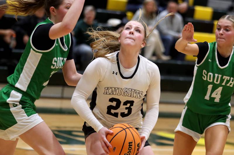 Kaneland’s Kendra Brown works under the net in IHSA Class 3A Regional Title Game girls basketball action on Friday, Feb. 21, 2025, at Crystal Lake South High School in Crystal Lake.