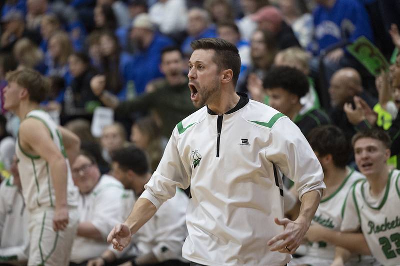 Rock Falls coach Zach Sandrock cheers on his team as the clock ticks down against Princeton Friday, March 7, 2025, in the Class 2A boys basketball Sectional final in Marengo.