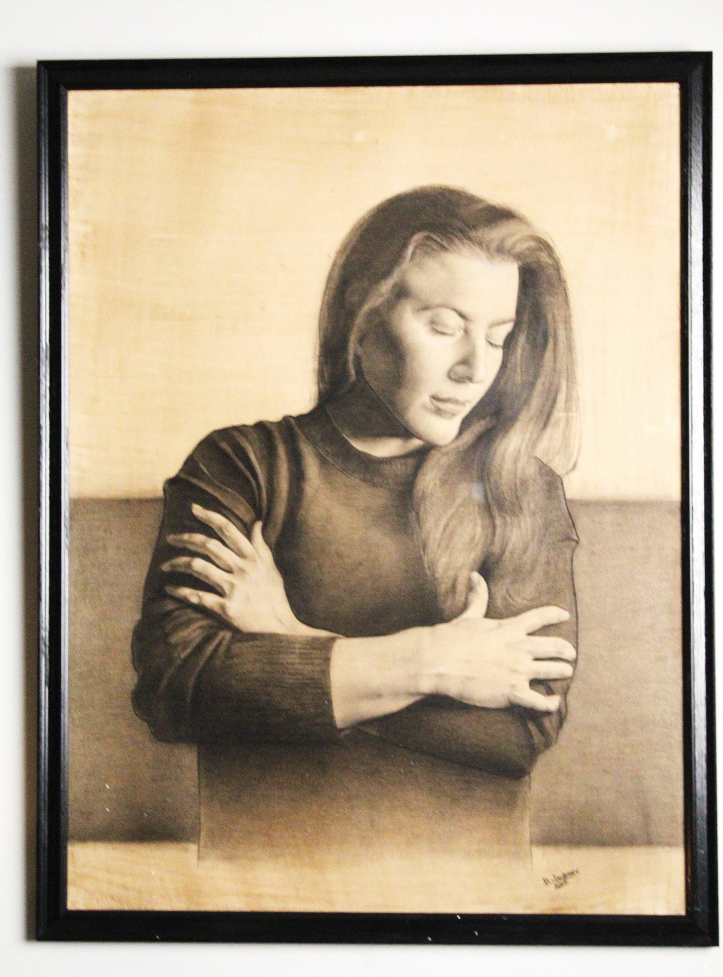 Ryan Jandrey's drawing of his girlfriend, Michele Kreczmer, is a 30-by-40-inch work completed in 2025 with graphite, charcoal and a touch of white chalk on hand toned and stretched Stonehenge paper. With this, and all over portraitures, Jandrey takes plenty of reference pictures to guide him on how he wants to make it look like.