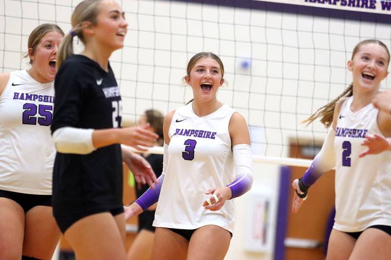 Hampshire’s Lily Ingve and the Whip-Purs celebrate a point in their two-set win over Huntley in varsity girls volleyball at Hampshire High School in Hampshire on Tuesday, Sept. 23, 2025.