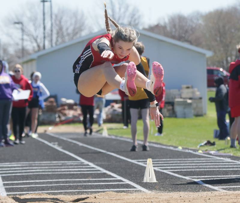 Amboy's Elly Jones does the long jump during the Rollie Morris Invite on Saturday, April 16, 2022 at Hall High School in Spring Valley.