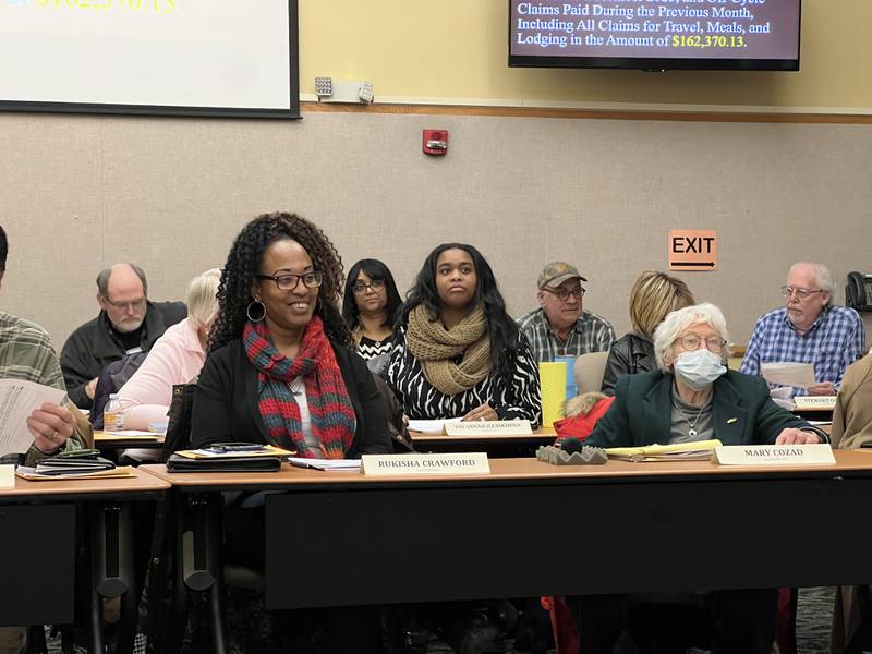 Rukisha Crawford, a Democrat from District 6, smiles after she and three others were approved to the DeKalb County Rehab and Nursing Center oversight board on Jan.17, 2024.