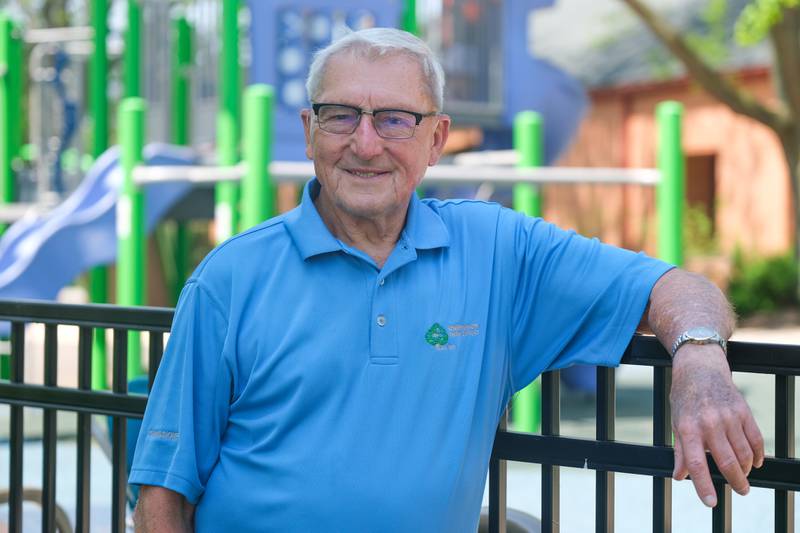 Channahon Park District board member Ron Lehman poses in front of the handicap friendly playground at the Arrowhead Community Center in Channahon. Friday, May 13, 2022, in Channahon.