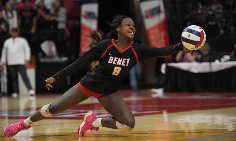 BenetÕs Aniya Warren reaches for a Mother McAuley shot in the Class 4A girls volleyball state championship match at Illinois State University in Normal on Saturday, October 11, 2023.
