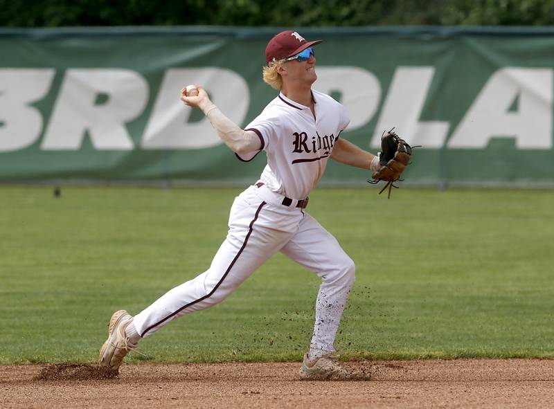 Prairie Ridge’s Brennan Coyle thows the ball to first during the IHSA Class 3A Grayslake Central Sectional semifinal baseball game against Cary-Grove on Wednesday, June 4, 2025, at Grayslake Central High School.