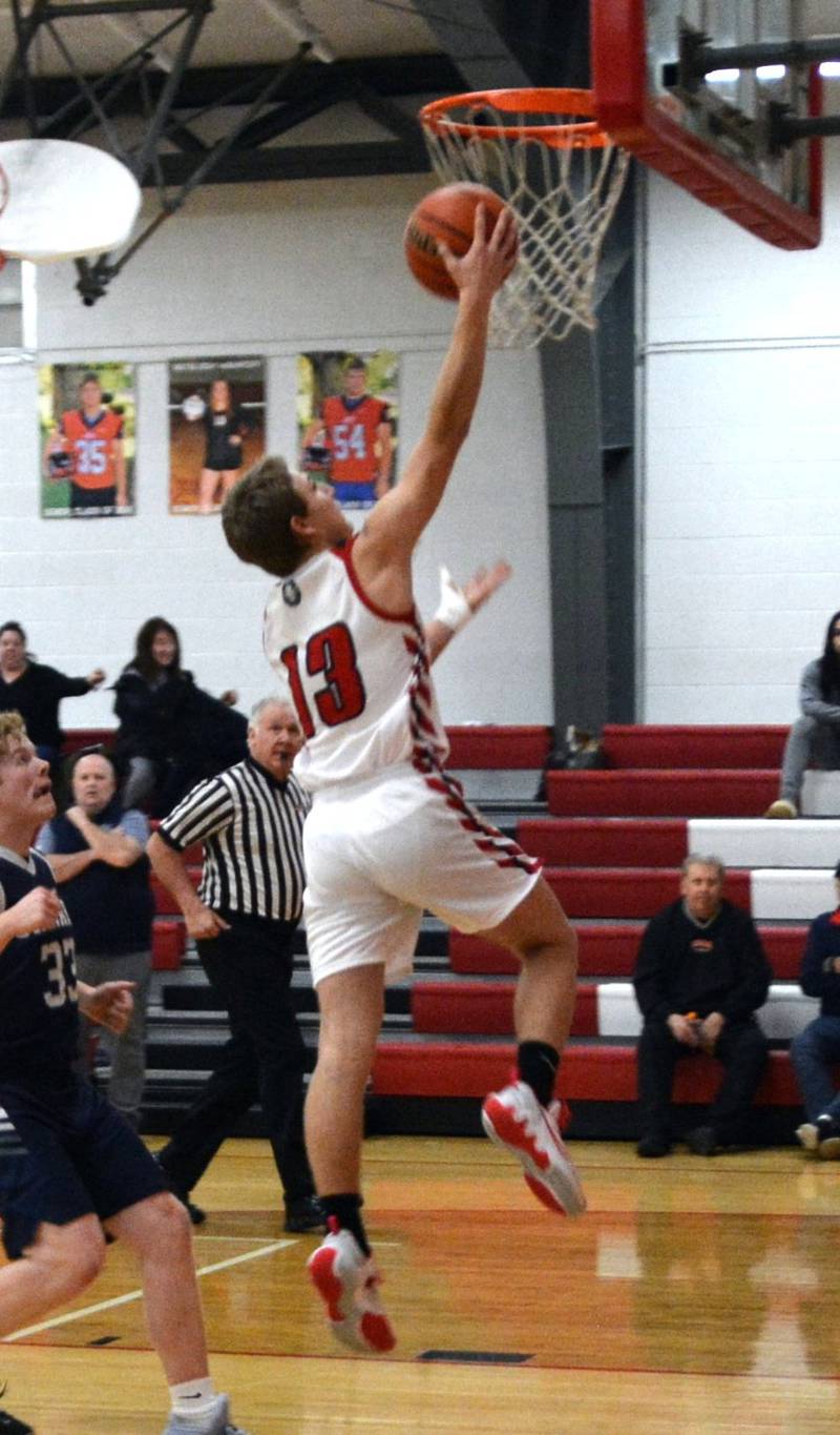 LaMoille's Braden Fischer takes in a layup against Calvary Christian on Wednesday in the LaMoille Holiday Classic. The Lions won 50-47.