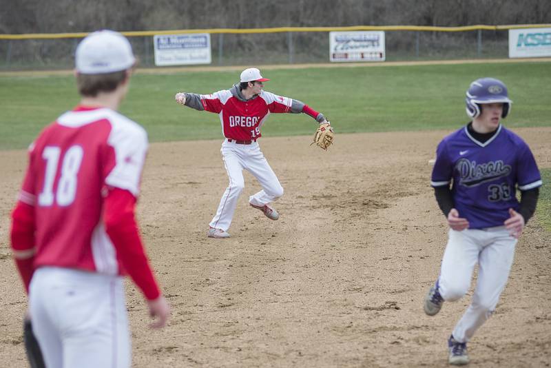 Oregon’s Tristyn Smith throws to first for an out against Dixon Tuesday, April 5, 2022.