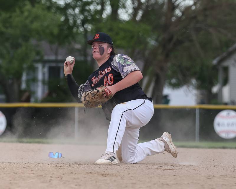 Sandwich's Chris Barbor (40) throws to first for an out during baseball game between Sandwich at Plano.  May 8, 2024