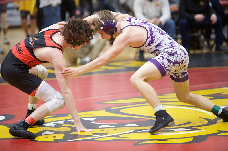 Batavia's Jack Duraski competes against Downers Grove North's Christian Chiarelli in the 132 lb weight class at the Clint Arias Invitational on Saturday, Jan.18,2025 in Batavia.