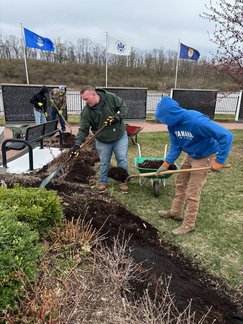 Laborers Local Union 393 members participated in the spring beautification project at the Middle East Conflicts Wall Memorial, cleaning out old mulch and installing new mulch, trimming trees and replacing old flowers.