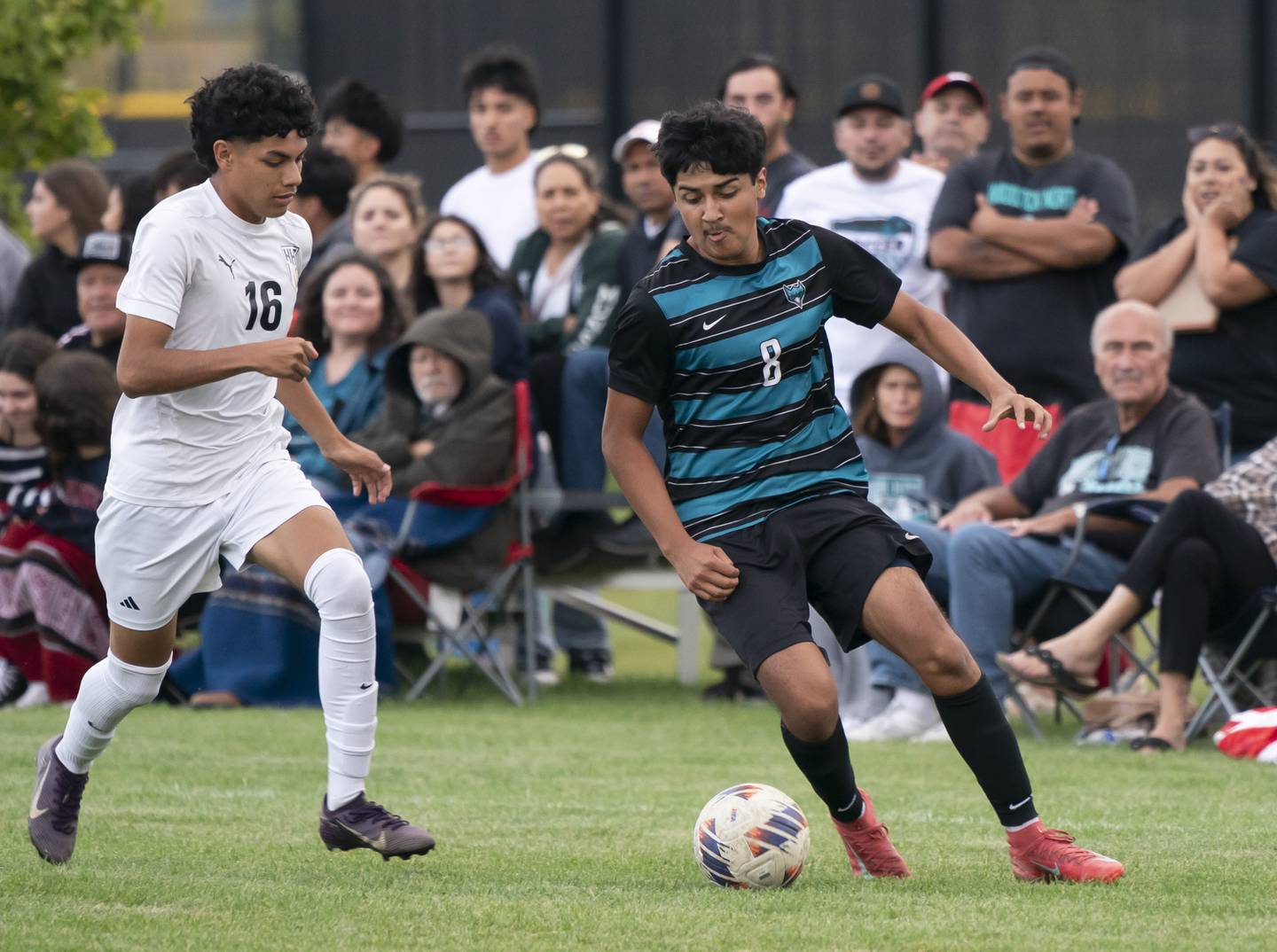 Harvard's Anthony Guadarrama defends against Woodstock North's Alberto Carbajal during the Kishwaukee River Conference Tournament Championship game on Monday, October 6, 2025 at Woodstock North High School. Ryan Rayburn for Shaw Local