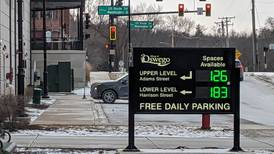 Oswego trustees discuss increasing fees for downtown parking garage