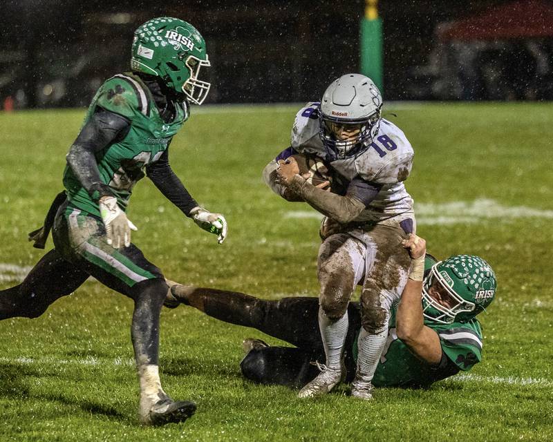 Jay Nevels (18) of Wilmington runs ball whilst being brought down by X on Saturday, November 8, 2025 at Seneca High School in Seneca.