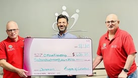 Marseilles Knights of Columbus donates $626 to Ottawa Friendship House from Tootsie Roll drive