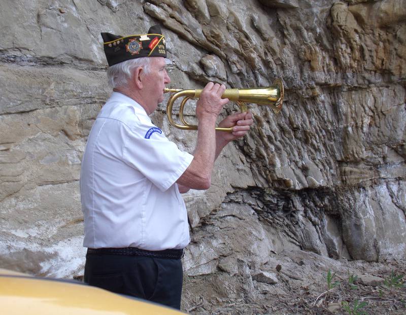 Taps is performed Monday, May 29, 2023, during a Memorial Dedication Ceremony at the Marseilles American Legion.