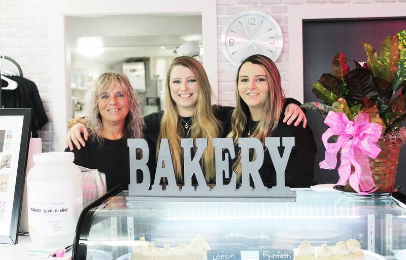 Cheeskake Ko. owner Katelyn Glavac (center) along with her mother Tina Glavac and sister Keri Creason bake plenty of unique cheesecakes from their store in downtown Ashton. The business started in 2022 when Katelyn made her first cheesecake, and it progressed into the opening of their store on Nov. 2, 2024.