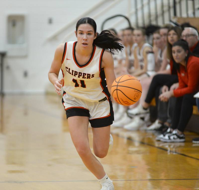 Amboy's Tyrah Vaessen (11) brings the ball up the court at the Oregon Girls Basketball Tip-Off Tournament on Wednesday, Nov. 20, 2024 at the Blackhawk Center in Oregon.