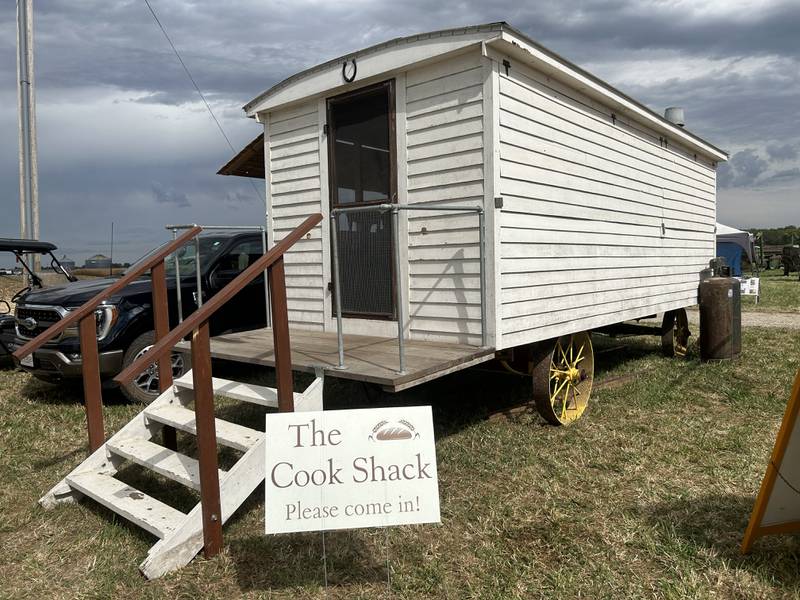 Kathy Smith of Erie was very busy on Saturday, Sept. 21, 2024 making corn bread in the "Cook Shack" at the Bos Bros. Historical Farm Old Fashioned Fall Harvest south of Erie on Springhill Road. Smith. Displays of antique ag equipment and hands-on demonstrations of past agricultural chores were highlighted at the event. Corn was picked from a field with vintage machinery and was then shelled and ground into cornmeal where Smith made cornbread on a gas stove in the shack. The wooden shack, mounted on wheels, was pulled to threshing sites so workers could eat during threshing sessions without having to leave the field.