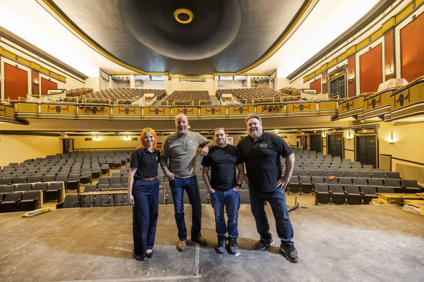 After months of being closed, The Dixon geared up for its March 2 reopening with the Broadway show “Spamilton.” Pictured prior to the reopening are theater manager Tori Highley (left), councilman Mike Venier, technical manager Scott Shipp and then-executive director Darren Mangler.