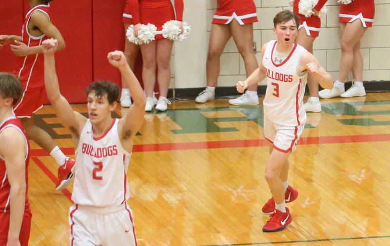 Streator's Matt Williamson and teammate Isaiah Weibel react after defeating Ottawa during the Class 3A Regional semifinal game on Wednesday, Feb. 26, 2025 in Sellett Gymnasium at L-P High School.