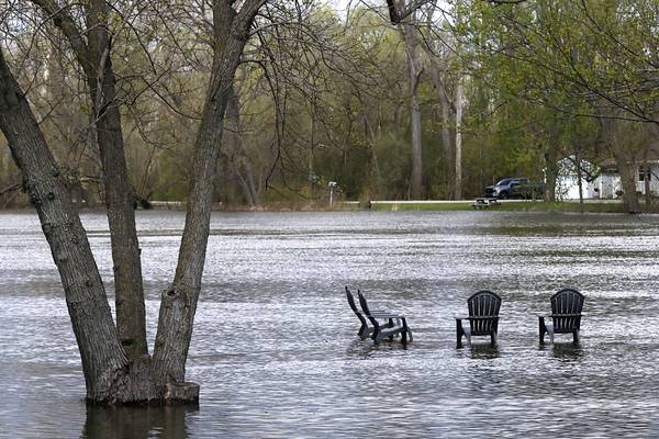 Fox River flooding prompts closures as wary residents await crest