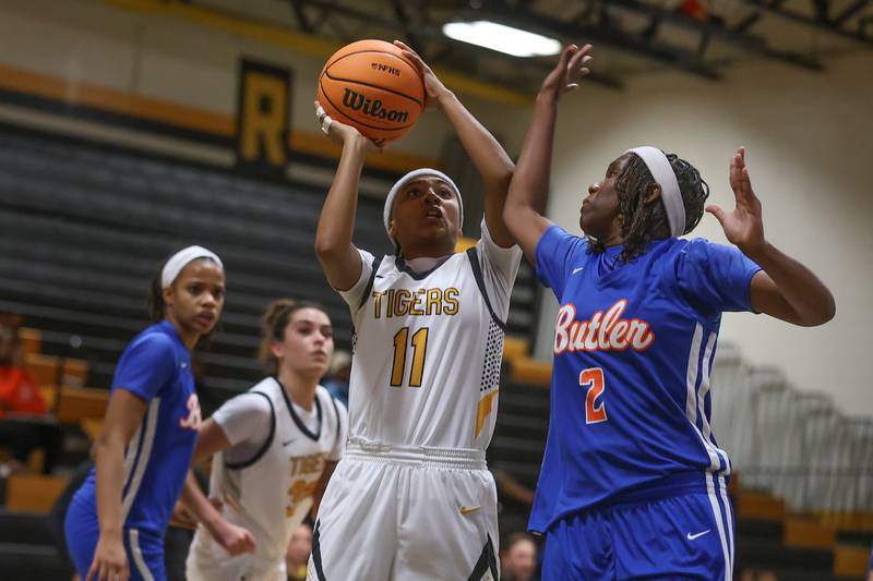 Joliet West’s Jada Perez puts up a contested shot against Butler College Prep on Tuesday, Dec. 16, 2025 in Joliet.