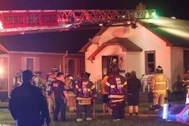 Photos: Firefighters respond to house fire in Spring Valley