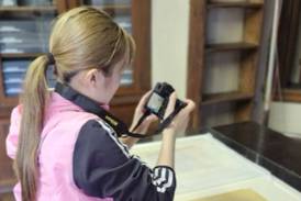 Japanese graduate student studies rare Buddhist paintings at Hegeler Carus Mansion