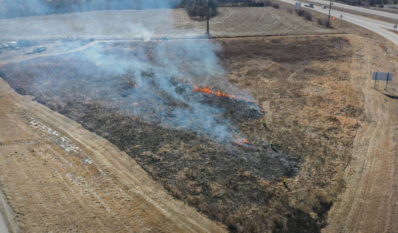 Crews from Semper FI Land Services along with the help from the Illinois Department of Transportation, conduct a controlled burn at Deer Pit Prairie near the intersection of Interstate 39 and Illinois Route 251 on Monday, Feb. 10, 2025 near Oglesby. The burns are designed to clear out invasive plants and encourage the growth of native prairie vegetation. Other locations that IDOT has another scheduled future burns are Indian Boundary Prairie near Ohio in Bureau County.