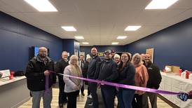 Plano Chamber of Commerce holds ribbon cutting for Postal Plus