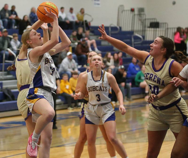 Somonauk/Leland's Abby Hohmann eyes the hoop as Serena's Maddie Glade guards the lane on Monday, Feb. 10, 2025 at Somonauk High School.