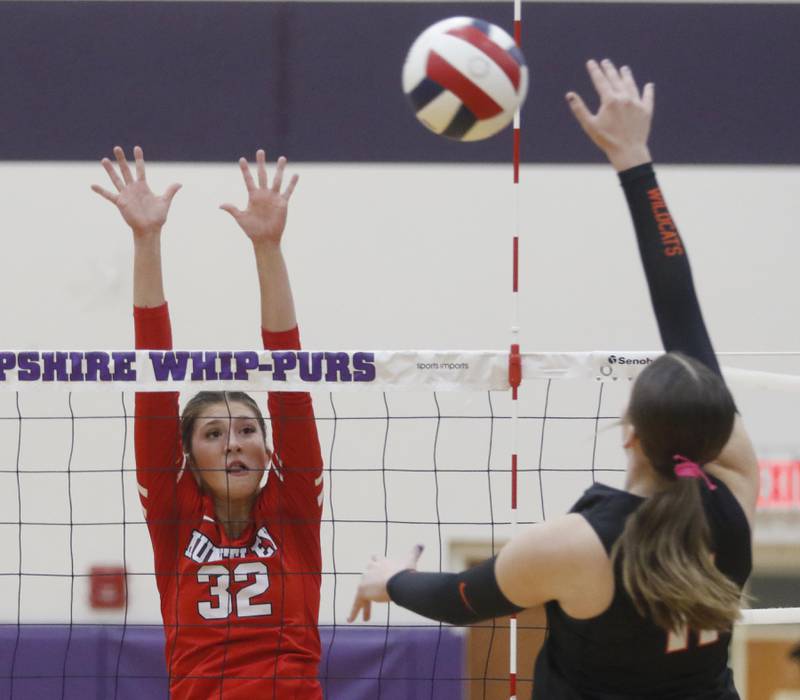 Huntley's Izzy Whitehouse tries to block the shot of Libertyville's Elle Knight during an IHSA Class 4A Hampshire Sectional semifinal volleyball match on Tuesday, Nov. 4, 2025, at Hampshire High School.