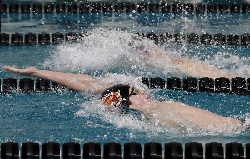 McHenry’s Robbie Rosenbaum competes in the 200 backstroke during the Fox Valley Conference Invitational swim meet on Saturday,  Feb. 15, 2025, at Woodstock North High School.