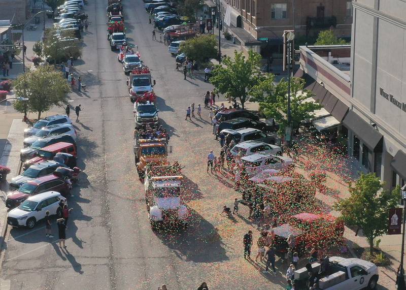 Confetti rains down during the L-P Homecoming parade on Thursday, Sept. 26, 2024 on First Street downtown La Salle.