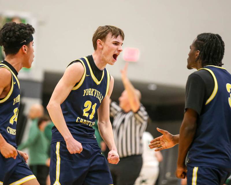 Yorkville Christian's Jordan Purvis (21) reacts after making a shot during their Class 2A Seneca Sectional final basketball game between Bishop McNamara at Yorkville Christian, March 6, 2026 in Senaca.