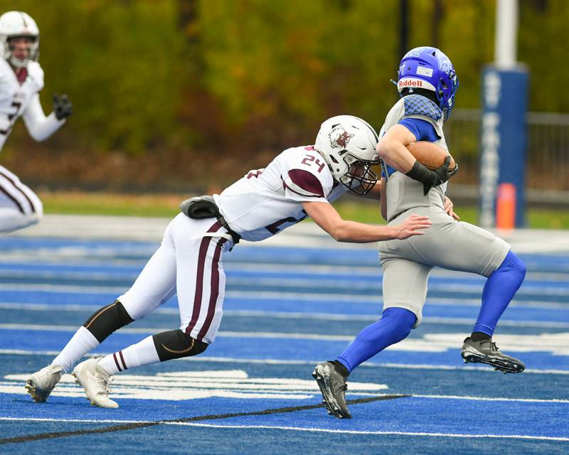 Prairie Ridge's Vincent Byk (24) gets a hold of St. Francis's Dario Milivojevic (12) during the second round of the 5A playoff game on Saturday Nov. 8, 2025, held at St. Francis's High School.