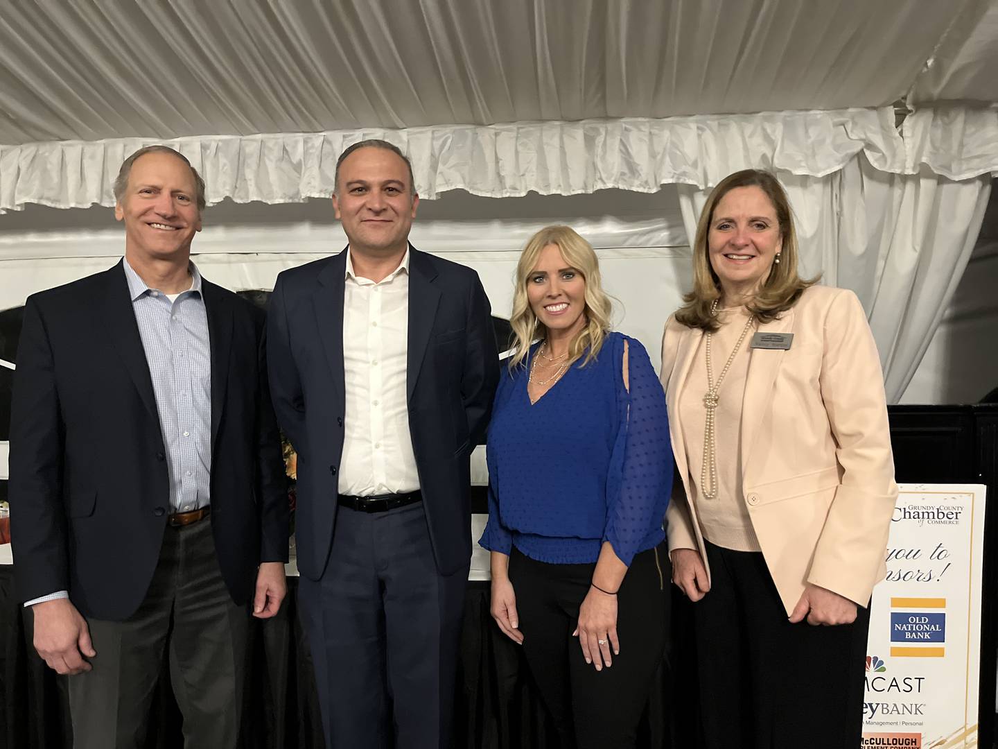GEDC Award Winners: Welcome to Grundy County (P&G) and Business of the Year (Mack & Associates). Pictured: GEDC Board Chairman Pete Brummel, P&G Site Leader Oguzhan Orucoglu, Mack & Associates Partner Tawnya Mack, GEDC President & CEO Nancy Norton.