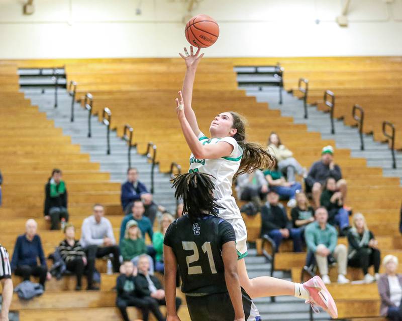 Ellie Kehoel (22) puts up a shot in their York Thanksgiving Tournament game between Oswego East at York on Monday, Nov 18, 2024  in Elmurst.