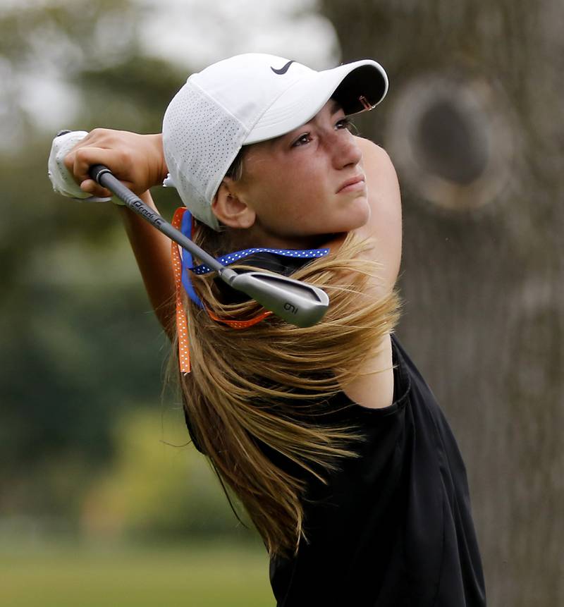 Crystal Lake Central co-op’s Giuliana Dickson watches the tee shot on the 13th hole during the Fox Valley Conference Girls Golf Tournament Wednesday, Sept. 24, 2025, at Crystal Woods Golf Club in Woodstock.