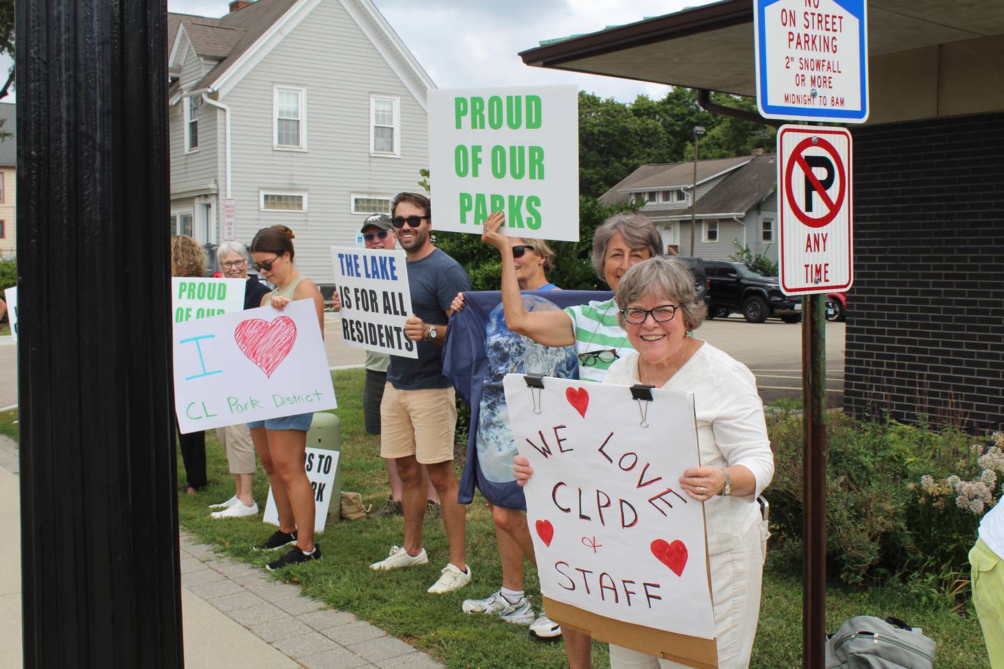 About 40 people rallied in support of the Crystal Lake Park District – and against recent actions by the park board – at a rally on Aug. 12, 2025, in front of park district headquarters.