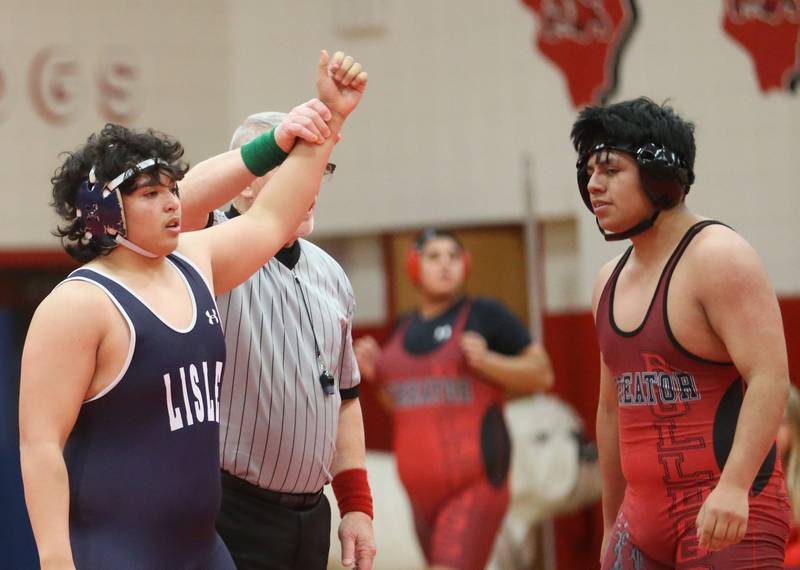 Lisle's Wilson Wunder wins his match over Streator's Streator's Ricardo Armenta during a meet on Wednesday, Jan. 21, 2025 in Pops Dale Gymnasium at Streator High School.