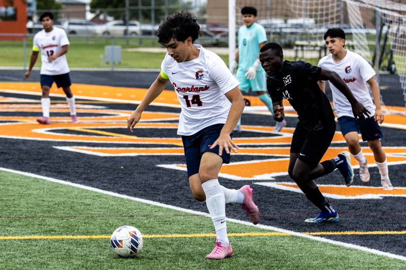 Romeoville's Juan Camacho makes a move during a varsity soccer away game against Minooka on Sept. 23, 2025.