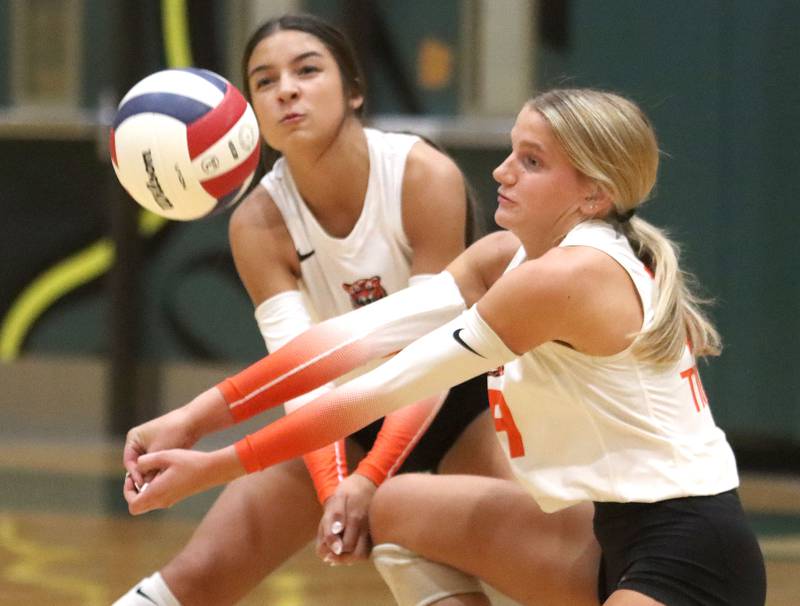 Crystal Lake Central’s Reilly McArdle, left, and Alexis Hadeler go for the ball  in varsity volleyball at Crystal Lake South High School in Crystal Lake on Tuesday, Oct. 7, 2025.