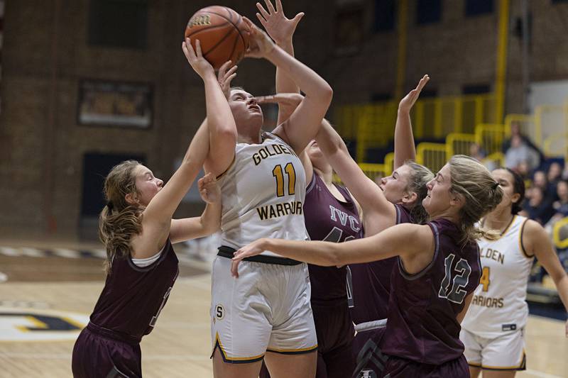 Sterling’s Kathryn Rowzee works below the basket Monday, Nov. 14, 2022 against IVC.