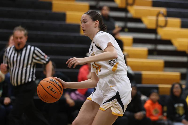Joliet West’s Ande Carlson looks to make a play against Butler College Prep on Tuesday, Dec. 16, 2025 in Joliet.