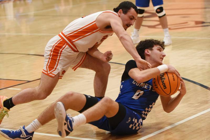 Clifton Central's Derek Meier, right, seizes control of a loose ball grom Gardner-South Wilmington's Tyler Gubbins during a River Valley Conference Tournament semifinal at Gardner-South Wilmington Wednesday, Feb. 10, 2026.