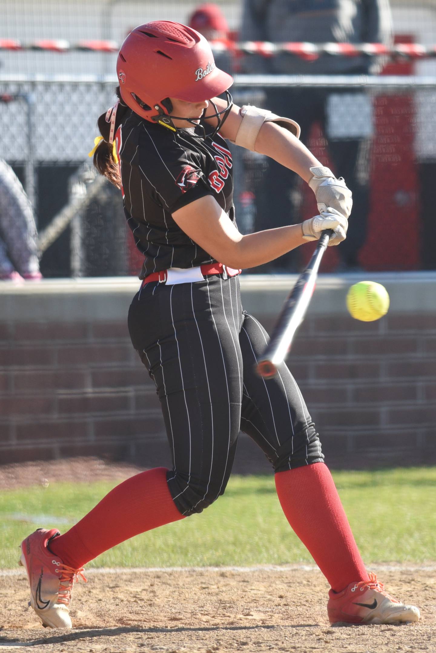 Bradley-Bourbonnais' Evi McIntyre hits a pitch during a home game against Sandburg Wednesday, May 13, 2026.