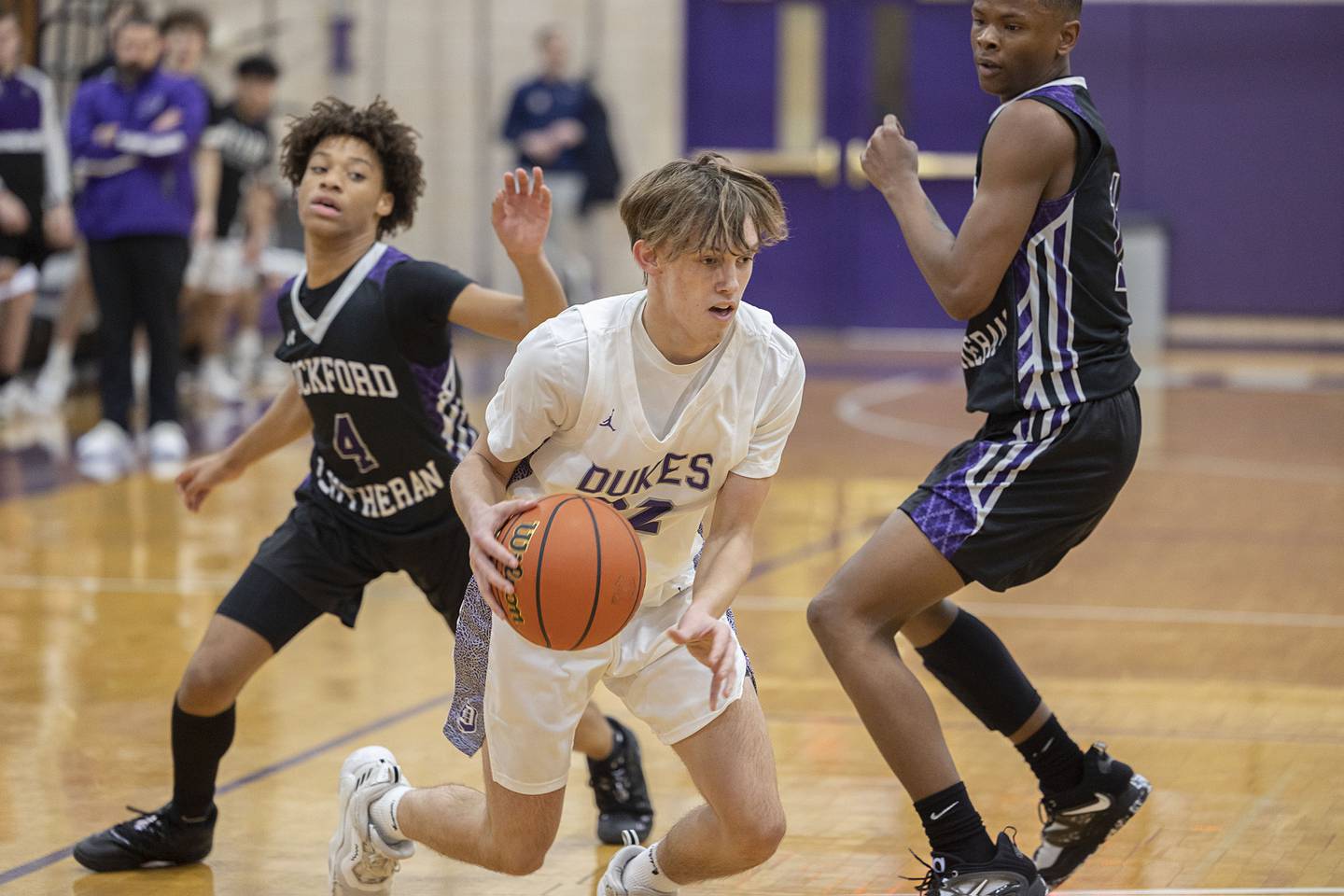 Dixon’s Bryce Feit handles the ball against Rockford Lutheran Friday, Jan. 20, 2023.