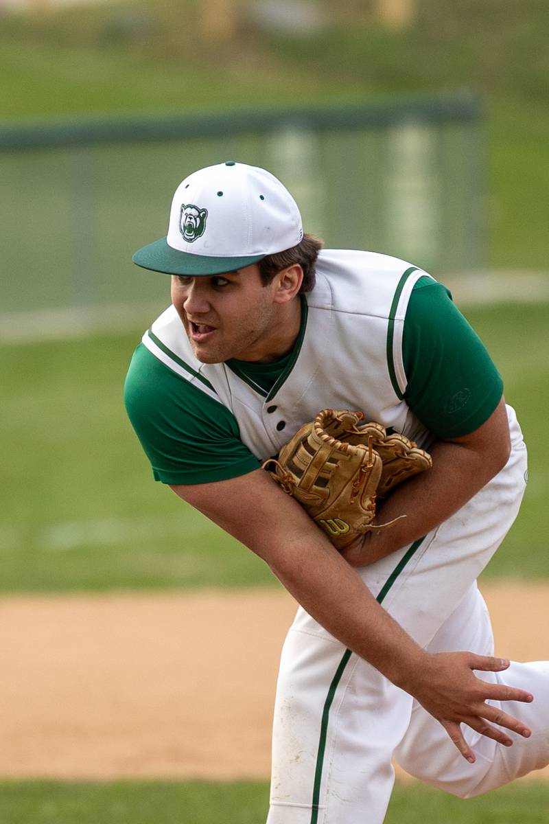 Alan Spencer (22) of St. Bede pitches on Thursday, April 10, 2025 at St. Bede High School in Peru.